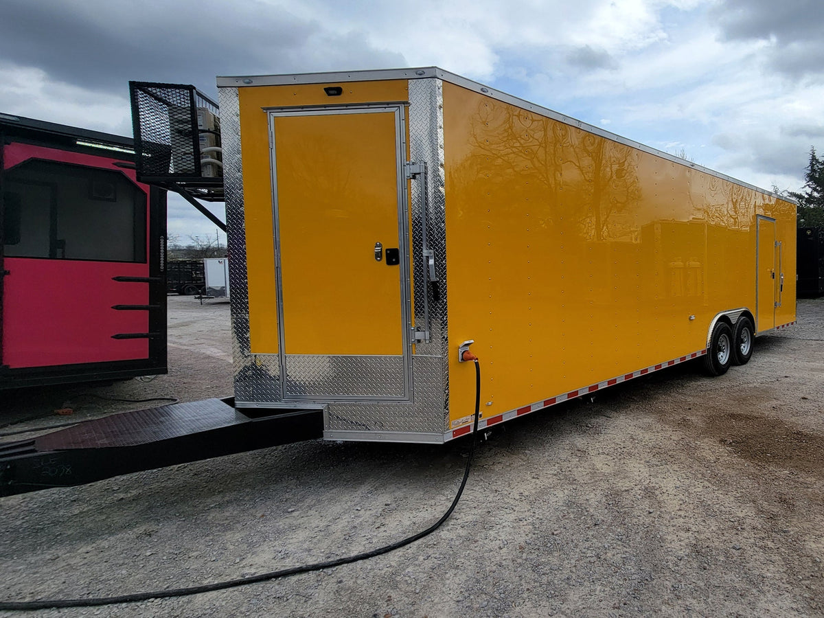 8.5' x 28' Custom Enclosed Yellow With 9' Porch With Lower Barn Door